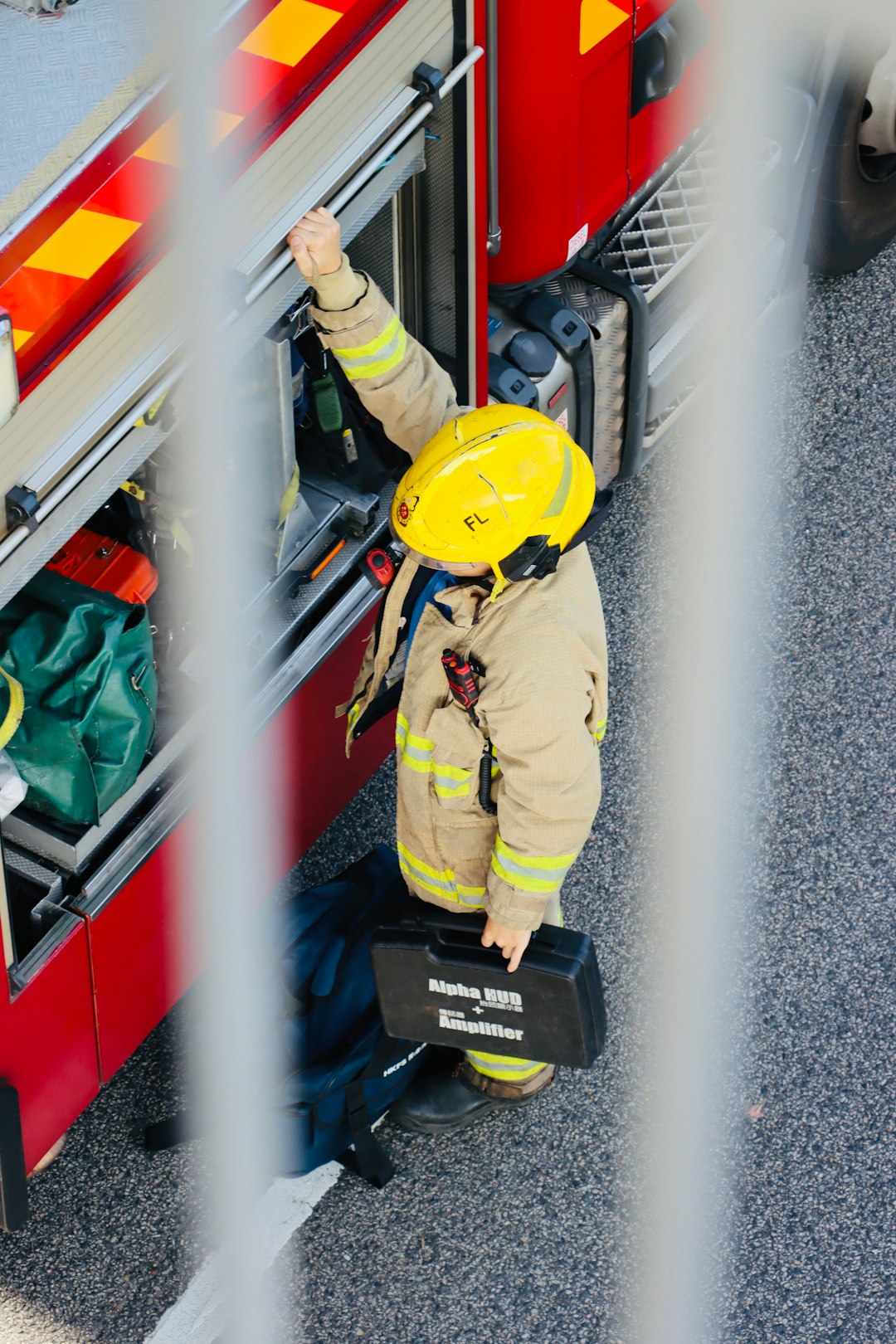 Offerings firefighter-in-uniform-with-helmet-and-case-itshs11lv4q